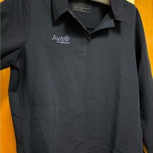 BNWOT FIGS Long Sleeve Nala Blue Large Scrub top — never worn, button sleeves **